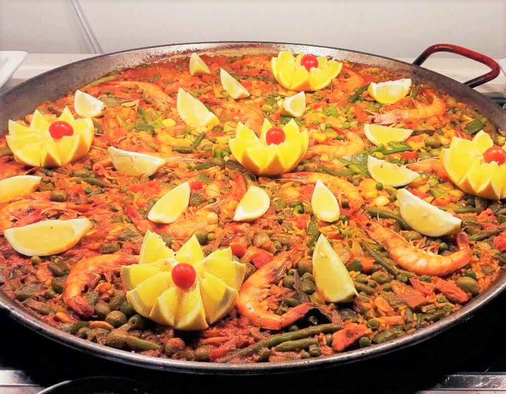 el puertito de adeje bay boat charter private serving paella